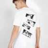 a man wearing a white shirt with a cartoon on it